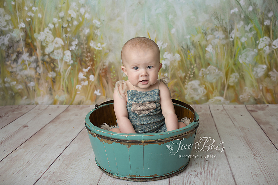 baby boy in a bucket