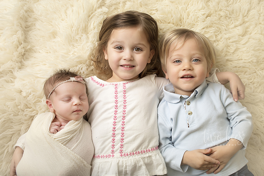best posed newborn shot with siblings