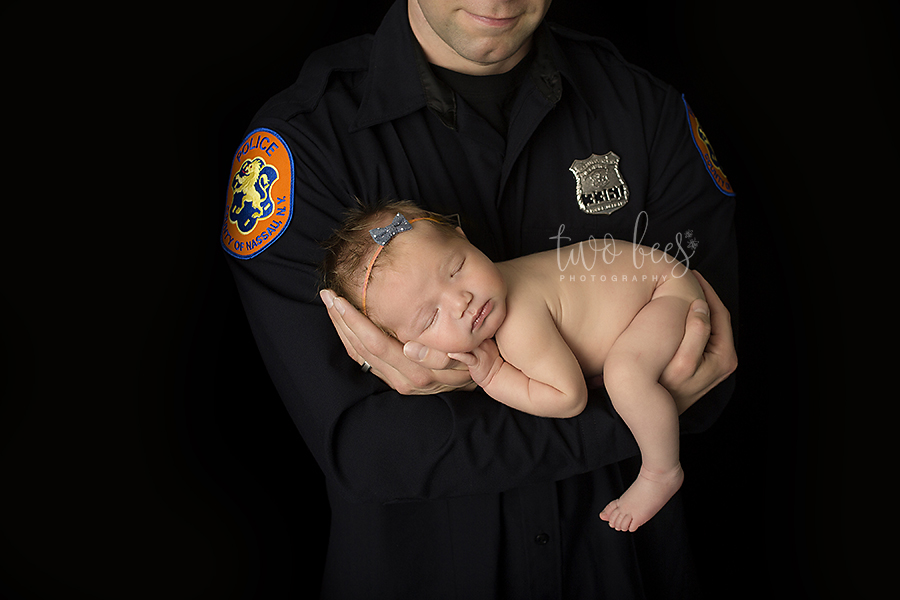 NYPD officer police baby newborn