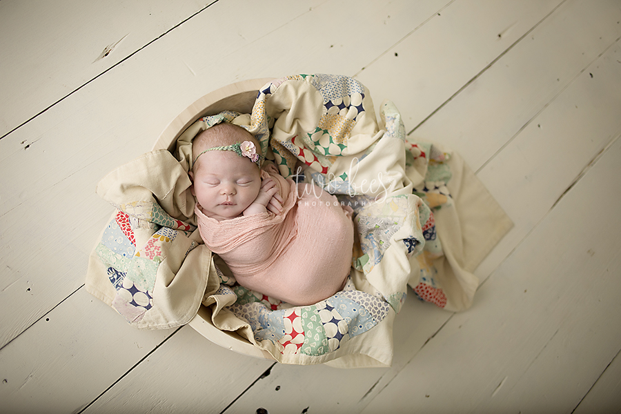 organic baby girl in a basket