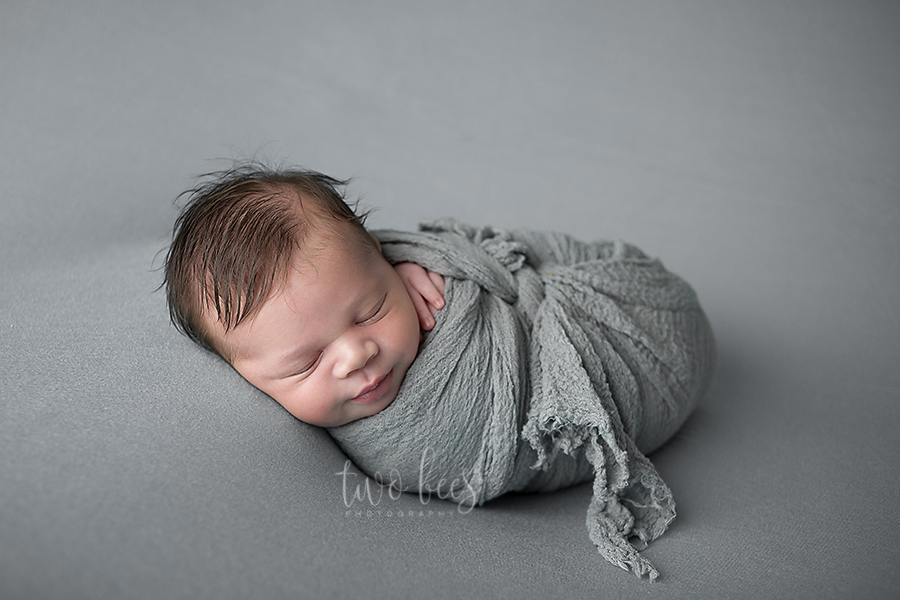 wrapped newborn baby boy